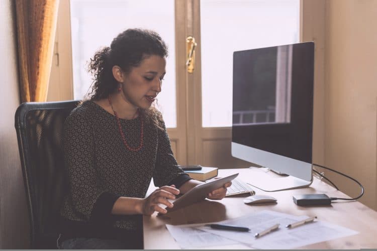 Young Woman Working at Home, Small Office