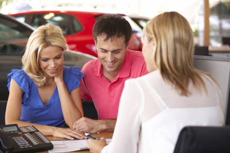 Couple buying new car